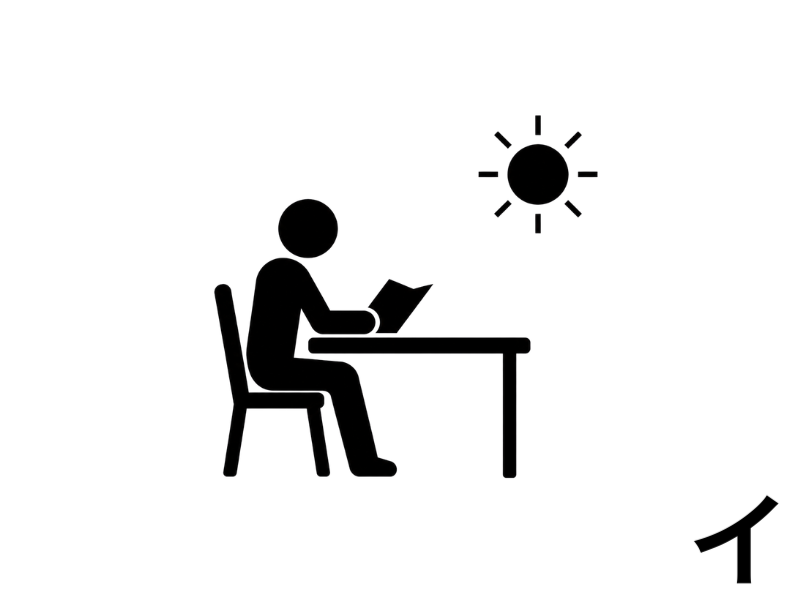 朝日を浴びながら机で一つの講義を読む人物のピクトグラム